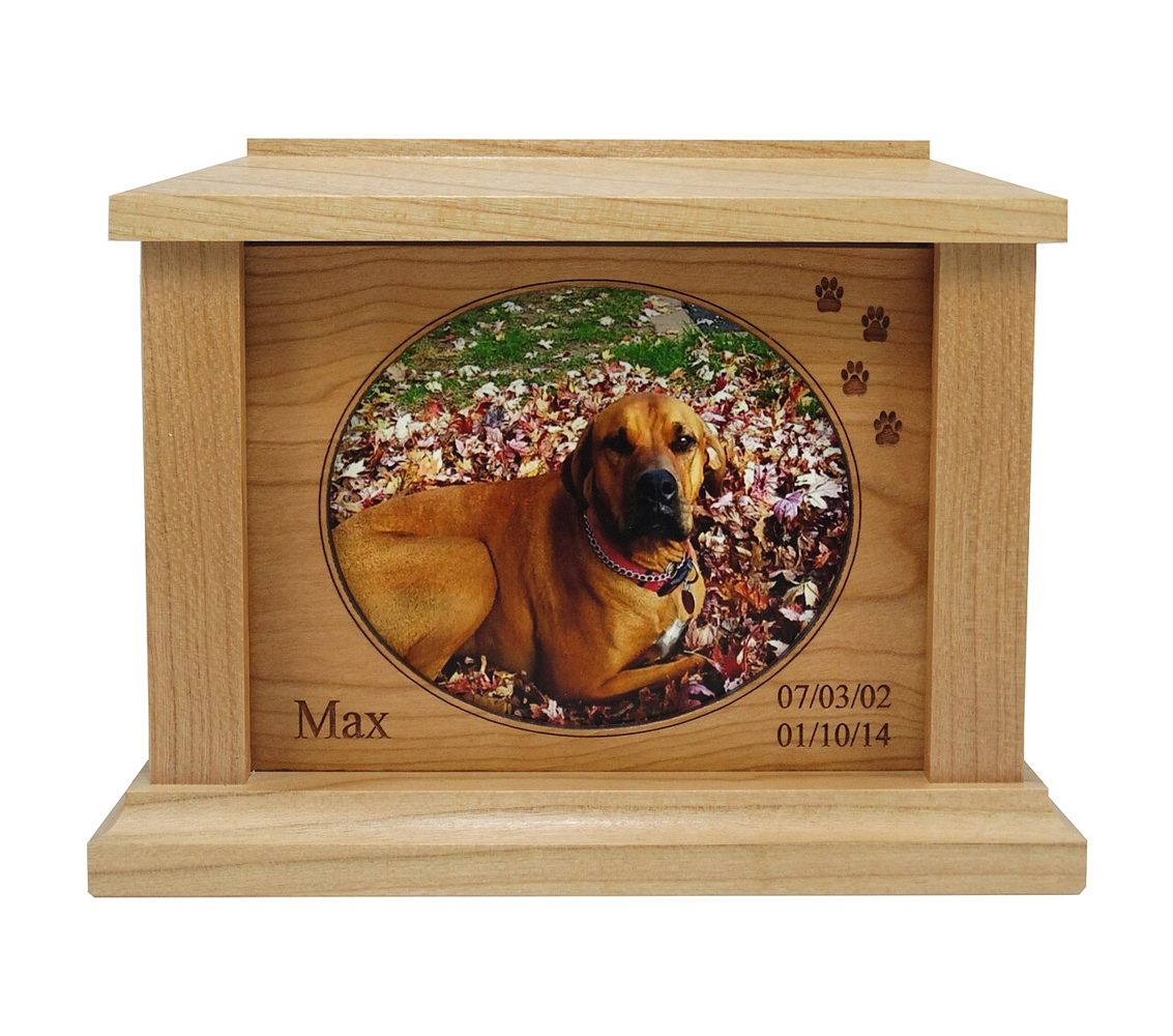 A wooden pet urn with a photo panel. An example of a memorial object, not a PawsHush customer story or a product endorsement.